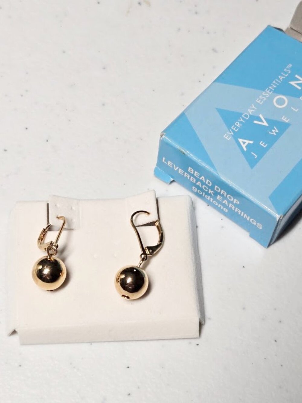 Vintage, New in box 2005 Avon bead drop leverback gold tone earrings